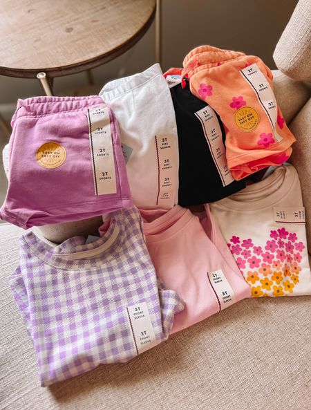 Toddler summer clothes haul from Target! So many cute colors and prints. All fit true to size and are by a great, durable brand (as field tested by my grads and dirt loving 2 year old).

#LTKfindsunder50 #LTKkids #LTKSeasonal