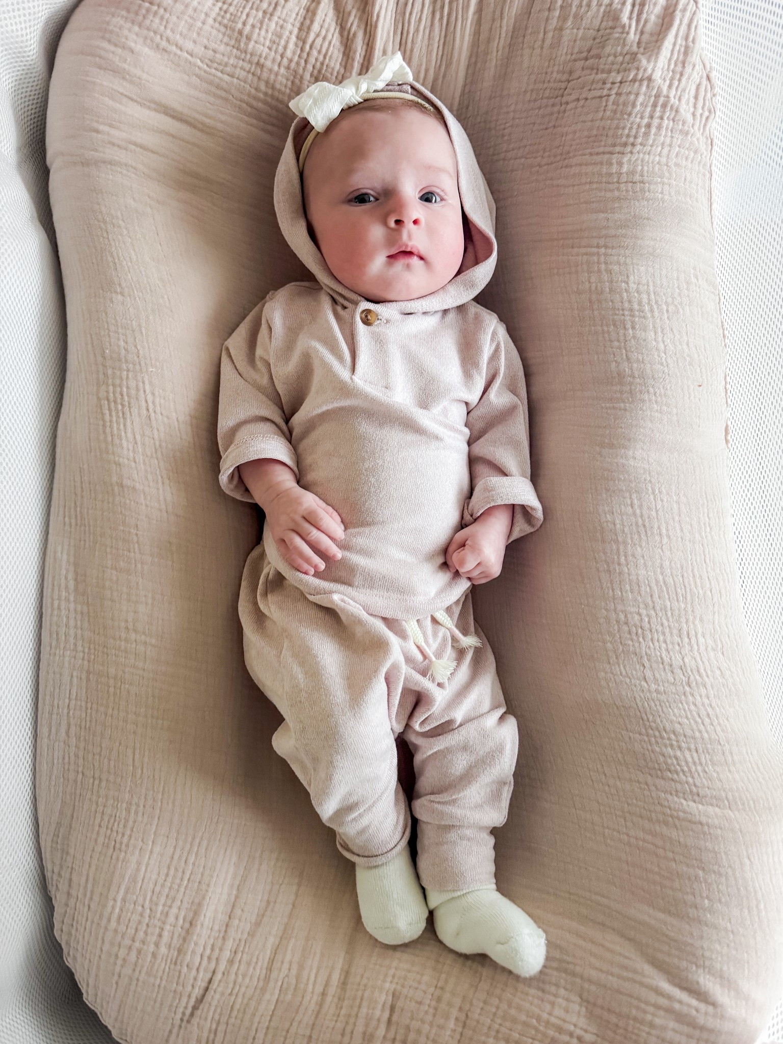 Baby girl is 22 inches and 10 lbs and wearing a 0-3 month 