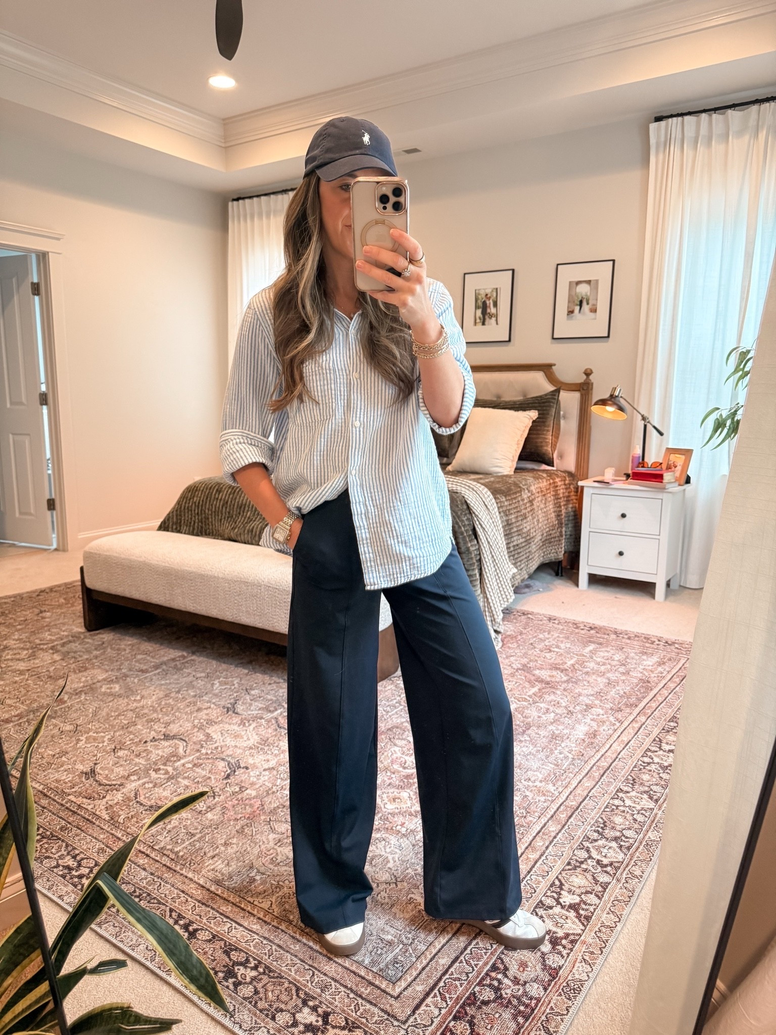 Easy elevated casual outfit with a coastal feel 🤍

Quince gauze wrinkle-free button-down + navy athleisure trousers + Adidas sneakers + baseball cap. Comfortable enough for errands or travel days, but still polished.

Sizing: Quince button-down: S | Athleisure trousers: XS

Use my Quince code INFG-26LINENANDLIGHTCO10 for 10% off your first order.

#LTKStyleTip #LTKTravel #LTKSeasonal #LTKClassicStyle #LTKAthleisure

#LTKmomlife #LTKgrwm #LTKootd