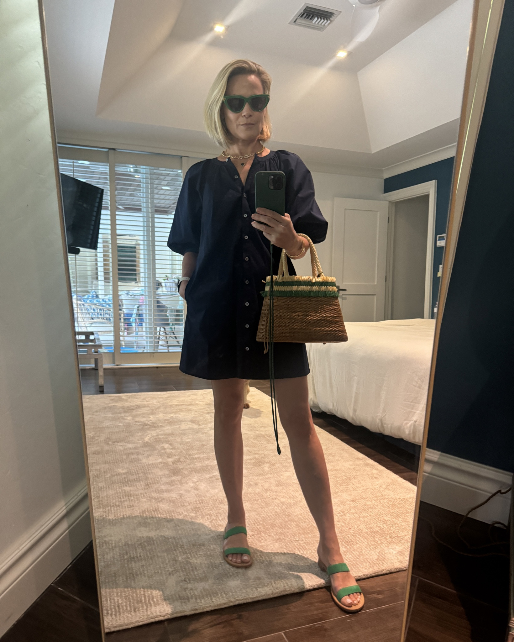 Streamline your look and opt for a clean & easy shape like this great cotton day dress from Staud. This dress is one of their best sellers and they do it every season. I have it in navy blue and white and it’s my go to dress when I need something easy but put together. 

Add a pop of color with accessories. I am really into this ‘bottega’ green color at the moment! These sandals were handmade by a fabulous shoe maker from Bermuda called Della Valle Sandals, but I have linked similar green sandals below from Gucci. The bag is also handmade by artisans in Bali, from a purpose driven independent brand that I wear often called Stelar. Again, they are not on LTK so i have linked some other options here to get a similar look.

#LTKstyletip #LTKSeasonal #LTKover40