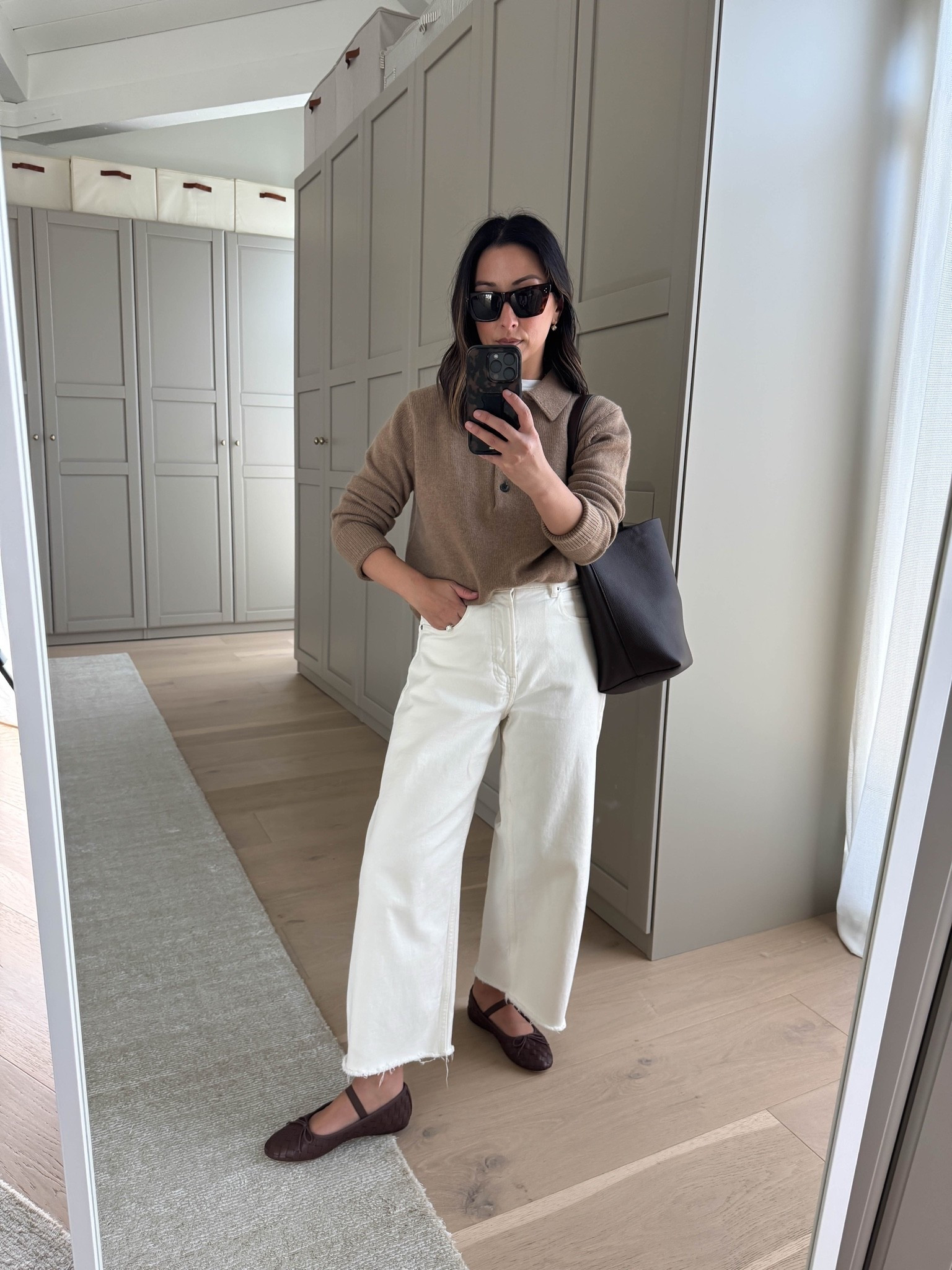 casual workwear outfit idea with jeans 

quince cashmere polo small- size up for a roomier fit.
Everlane way high curve jeans 26 (cut hems)
Loeffler Randall flats 5.5
Quince bucket bag small

#LTKWorkwear #LTKPetite #LTKOver40