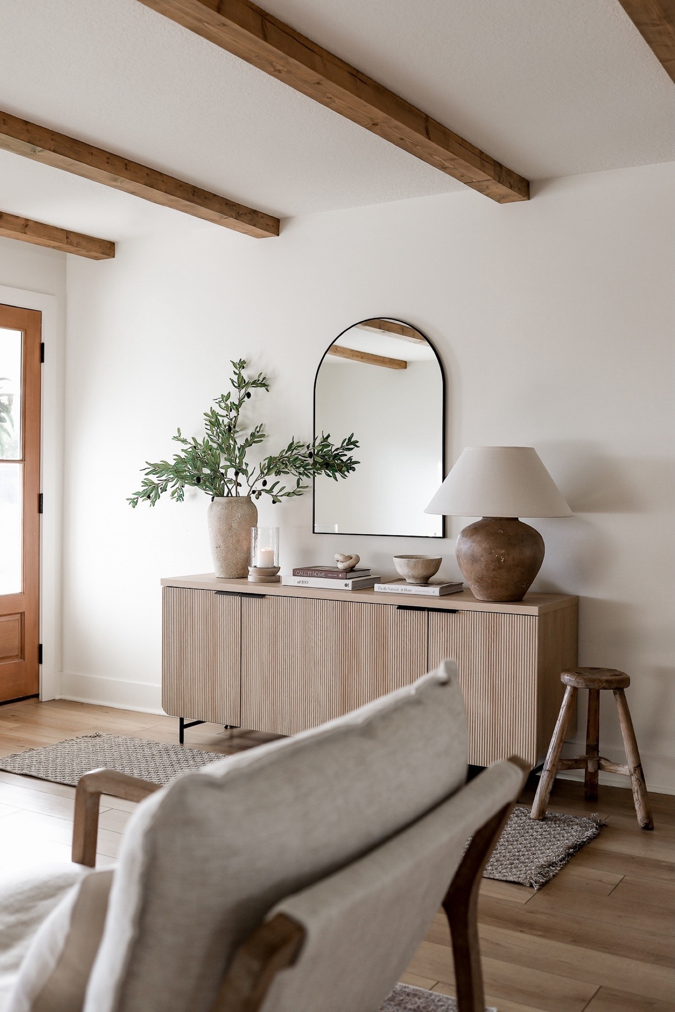 President’s Day Sale 🎉

Shop my modern organic entryway featuring this designer-look sideboard cabinet, arched mirror, pottery barn vase, faux olive stems, vintage style lamp, neutral runner rug, vintage stool, and coffee table books! 

WALLS & TRIM: Benjamin Moore Swiss Coffee at 75%

#LTKsalealert #LTKhome #LTKSeasonal