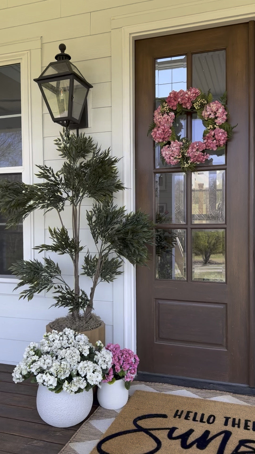 My spring porch this year turned into my summer porch too! Usually I change things up but haven’t had the time! Still loving these trees and gorgeous pink hydrangea wreaths!

#LTKSeasonal #LTKHome #LTKSaleAlert