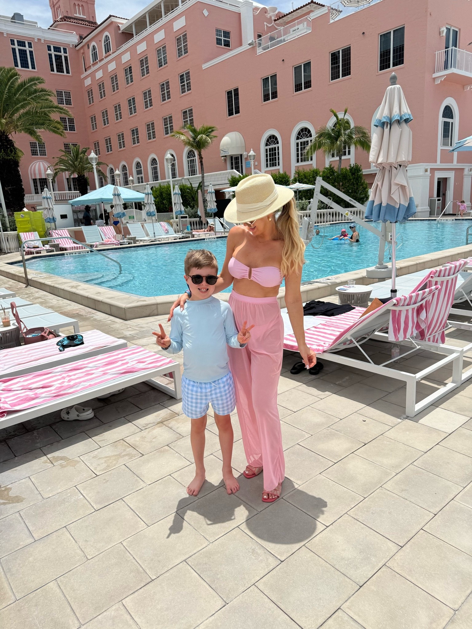 Don Cesar vacation vibes. Wearing size small in pink swimsuit set. Reynolds is wearing size 7 in rash guard.  

#pinkswimsuit #swimsuitset #vacationstyle #resortstyle #pinkbikini

#LTKSwim #LTKOver40 #LTKKids