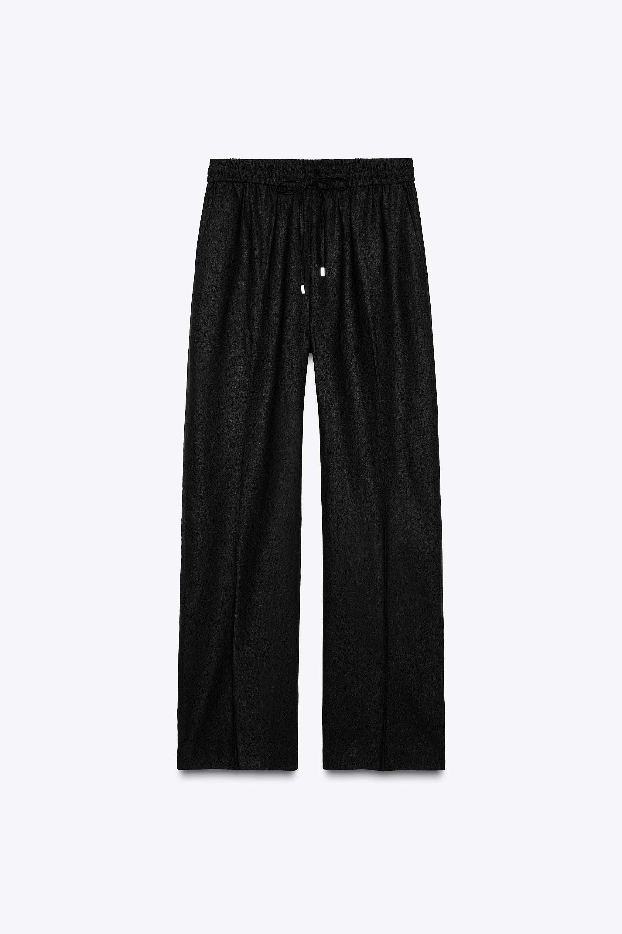 High-waist trousers made of a linen blend. Adjustable elasticated waistband with drawstrings. Fro... | Zara US