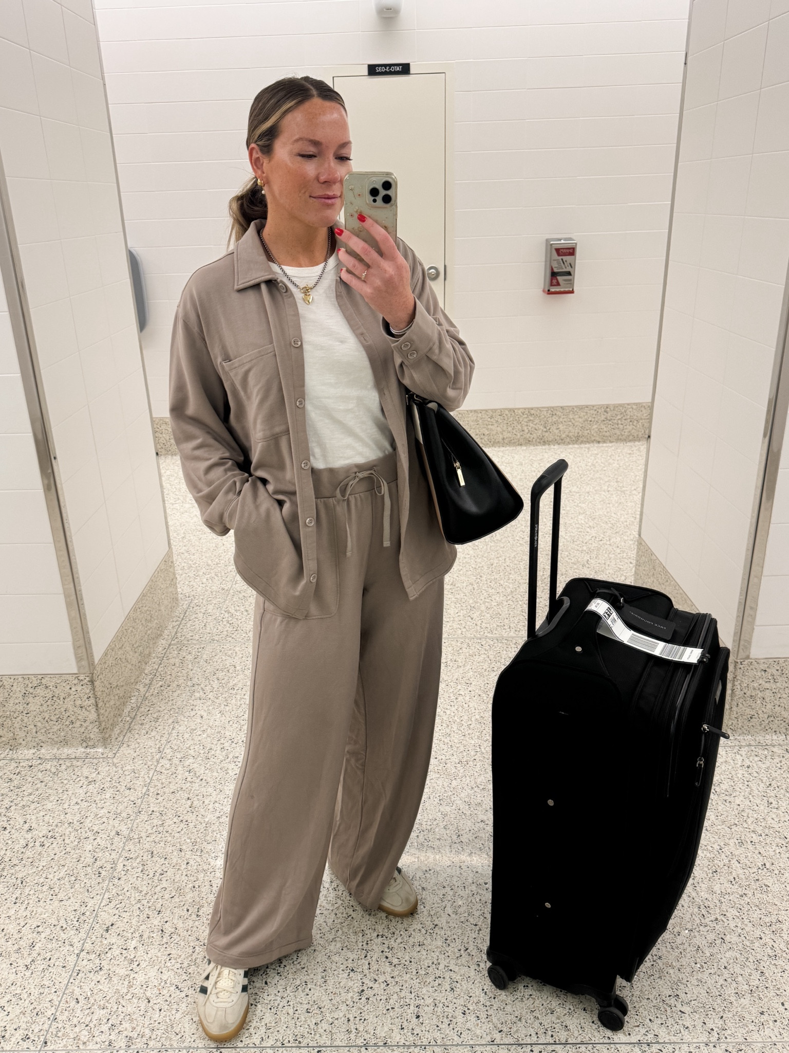 Wearing a medium in top and bottom. Most comfortable set I own. Worth every penny! 