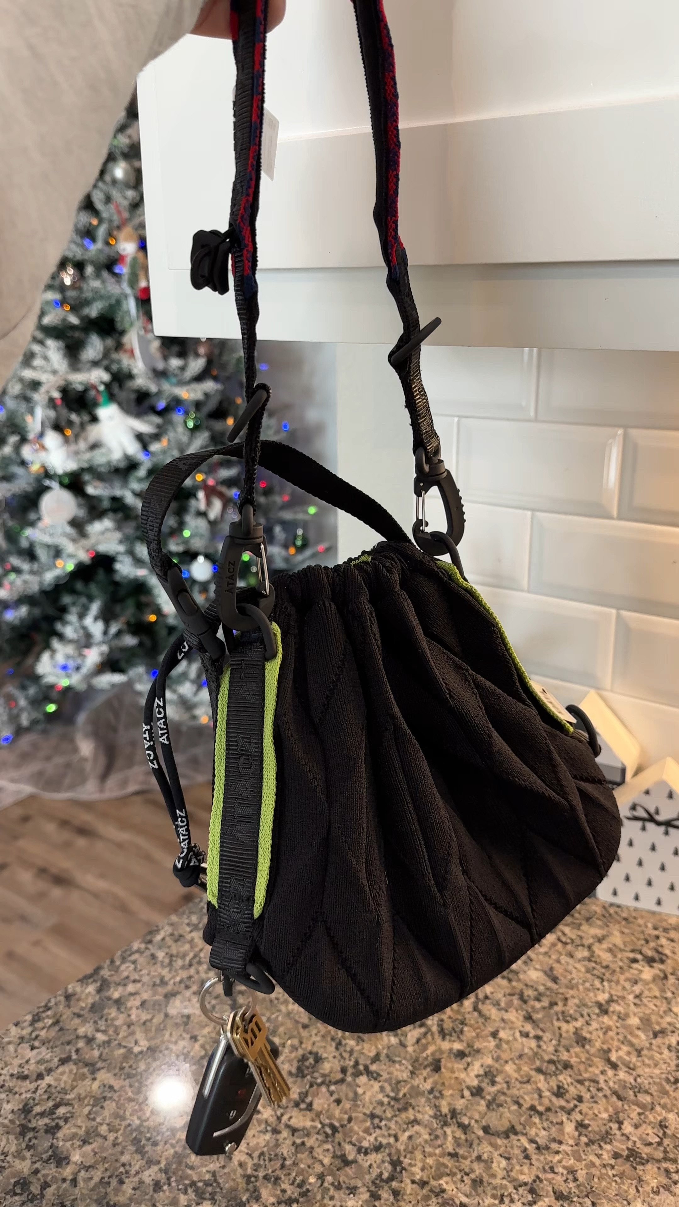 If you’re looking for the perfect sustainable gift for your loved ones, Atacz bags and accessories are both biodegradable and eco-conscious. I have the black twist bag paired with the red striped strap for a festive Christmas look!  Also For every order in December Atacz will provide a festive card writing service.- I’ll provide the Like to know it link in my bio! / @atacz.club  #ataczclub #sustainablefashion #sustainable 

#LTKGiftGuide #LTKItBag #LTKHoliday