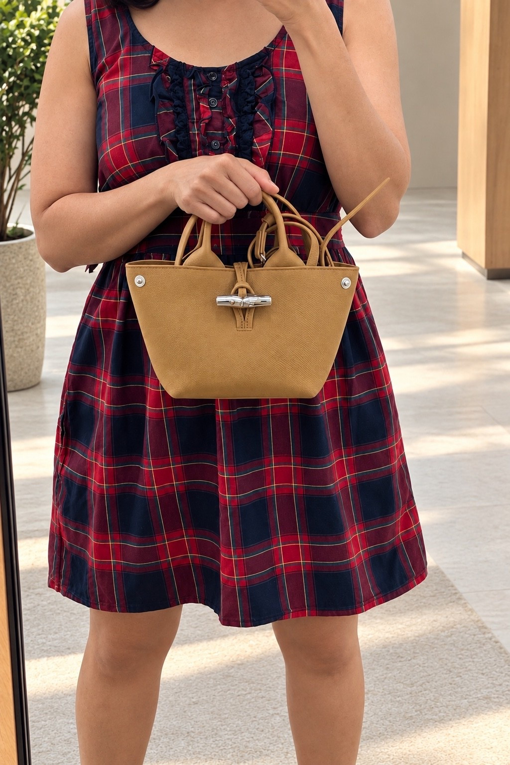 This dress is about 15 years old. I almost donated it, but realized I still genuinely like it—the plaid, the colors, the little details.

The red + navy feels classic, and I love how the camel bag warms everything up.

Not everything in our closets needs to be new to feel good. So I kept it. And, it still gets to come out for a little fall moment. 🍂

#LTKootd #LTKSeasonal #LTKOver40