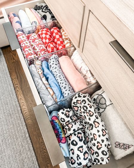 These clear acrylic adjustable dividers are perfect for keeping neatly folded rows within dresser drawers. We love how tidy they keep everything and how clean they look. We aren't ones to just stick a bunch of product everywhere but the goal is to keep things contained and orderly so these perfectly fit the bill!

