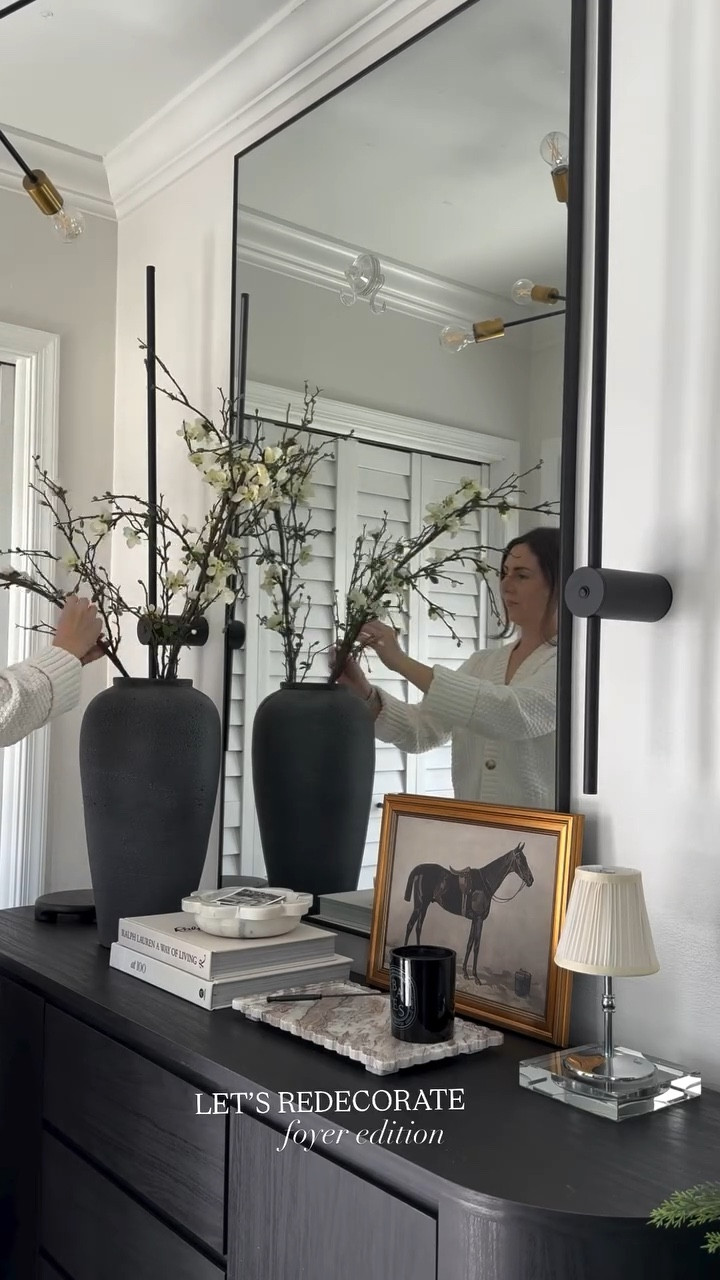 A little refresh in the foyer. I love my @afloral blossom stems to make the the space feel refreshed and elevated 🤍✨ I have been using these exact stems for the past 4 years - they are timeless and long lasting. 

Follow and comment LINKS for direct links sent over to you via DM 🤎 #decor #homerefresh #homestyling #myhomeinterior