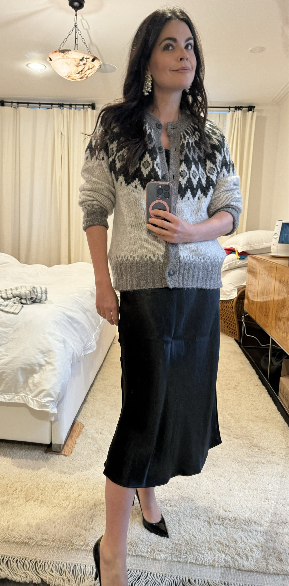 Dressed up the sweater I wore the other night, which totally goes from
sweatpants, to jeans, to dressy with a black satin skirt and patent pumps. The earrings are 😍

#LTKHoliday #LTKstyletip #LTKsalealert