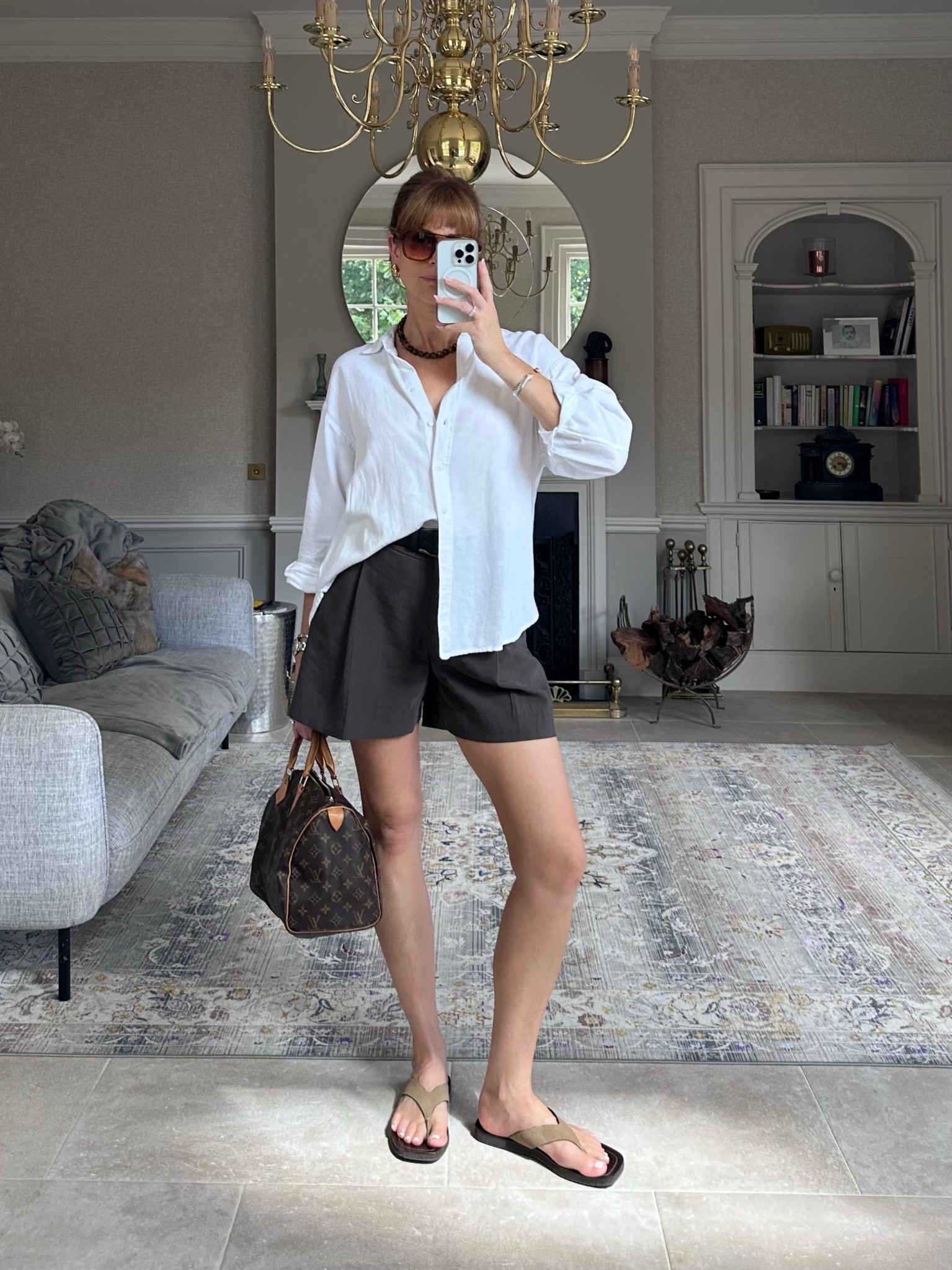 White shirt size M
Brown tailored shorts size 12
Louis Vuitton bag
Suede flip flop sandals 

#LTKsummer #LTKuk