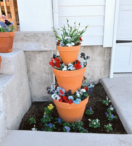 Patriotic flower stand links with faux florals from Michaels - all terracotta clay pots from Lowes! 

#LTKfindsunder50 #LTKSeasonal #LTKhome
