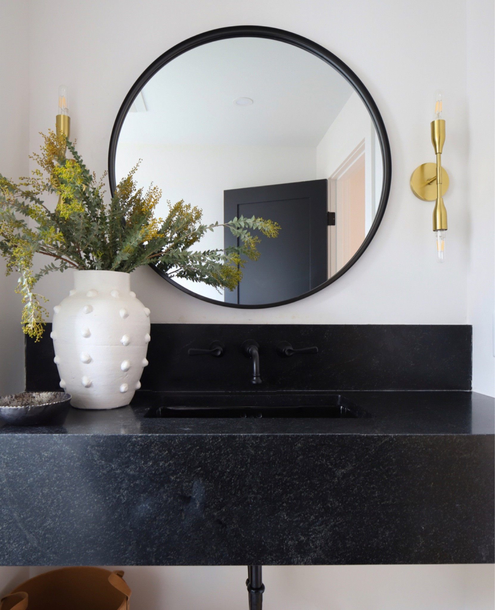 All you need for a simple guest bath sink style is a killer vase. This is one of my favorites and can be styled in so many different ways! This one is old, but I’ve linked vases with similar style, color and texture  



#LTKFind #LTKunder50 #LTKGiftGuide