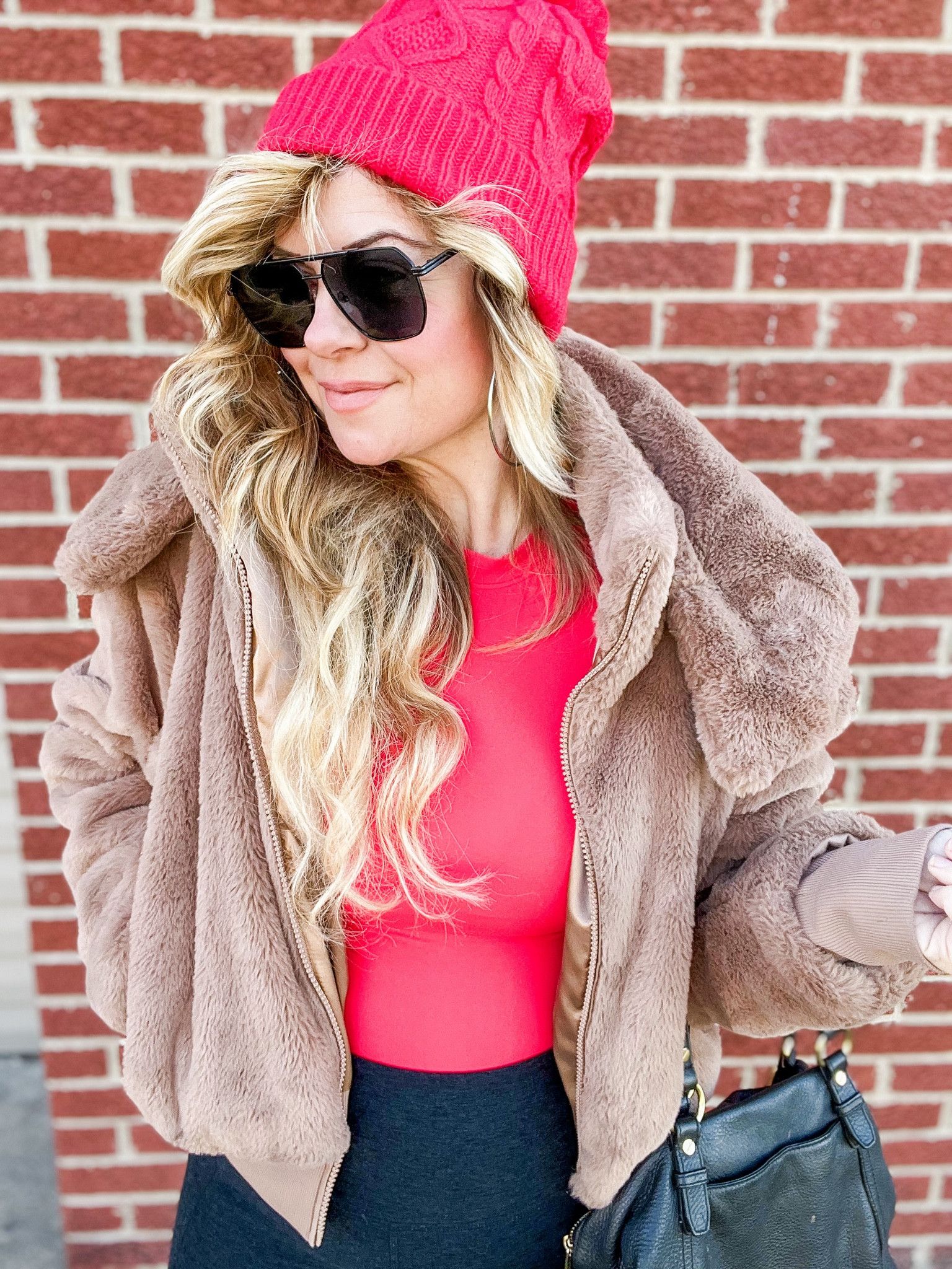 Red stocking hat
Stylish show stopping winter coat/ jacket 
Red bodysuit from Amazon 
Beyond yoga black leggings with pockets butter soft!
Black matte shades from Amazon 
The Chelsea boot from Amazon 
Winter outfits 
Christmas outfits 
Holiday outfits 
Cozy outfits 
Black leather bags 


#LTKstyletip #LTKfitness #LTKSeasonal
