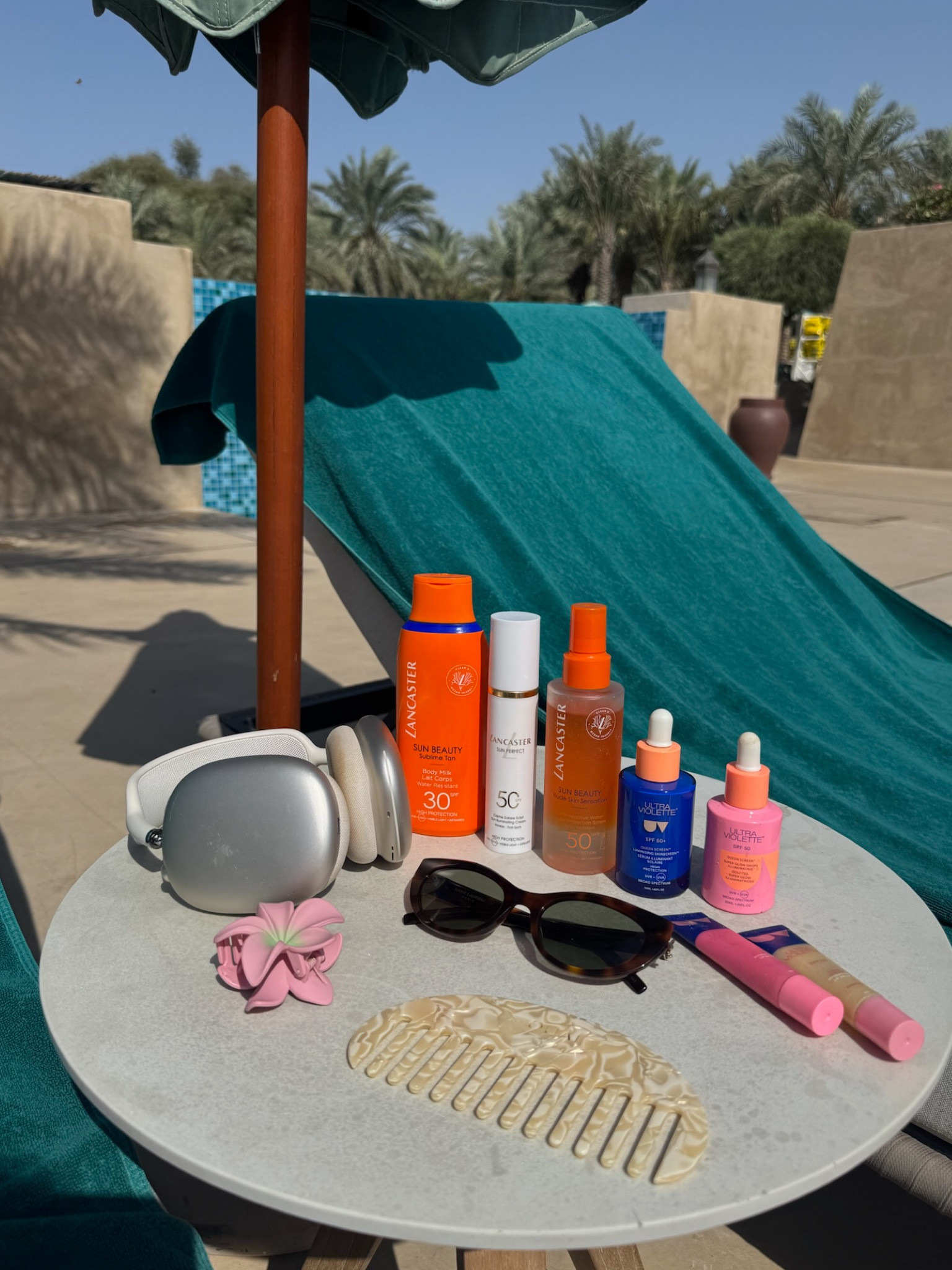 Essentials for by the pool ☀️

#LTKuk #LTKbeauty #LTKswimwear