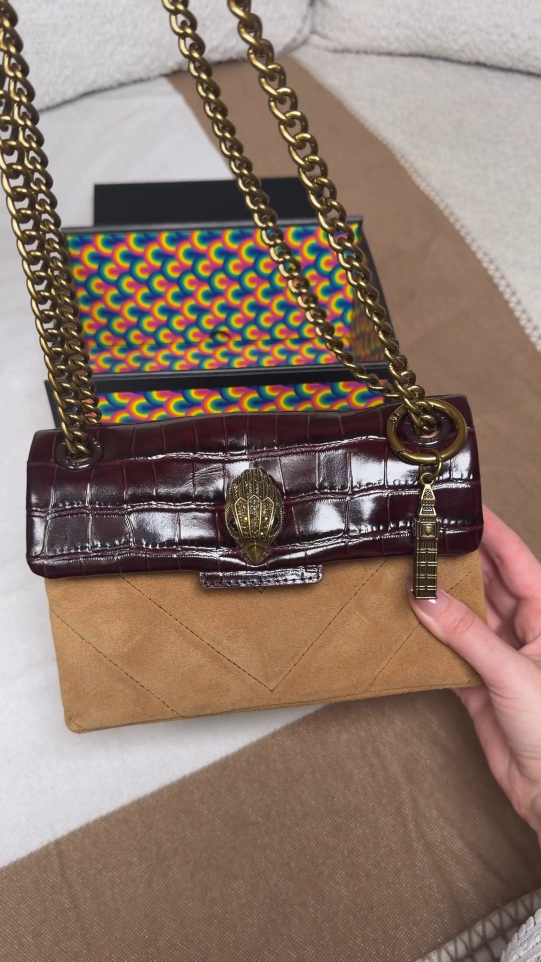 Unbox my new personalized Kurt Geiger bag 😍 Comment BAG & I’ll dm you the link to personalize yours ❤️

I love how you get to customize every part of this bag by choosing the material you want for the body and flap. Then you get to choose the eagle head style you want on the flap. Choose your hardware color then finish off by adding any bag charms you want 💖

Personalizing a Kurt Beiger purse in store is now on my 2026 bucket list! 

I chose the tan suede for the body and the croc embossed brown leather for the flap. I chose brass for my hardware and eagle head the finished off the to a brass Big Ben charm 💖