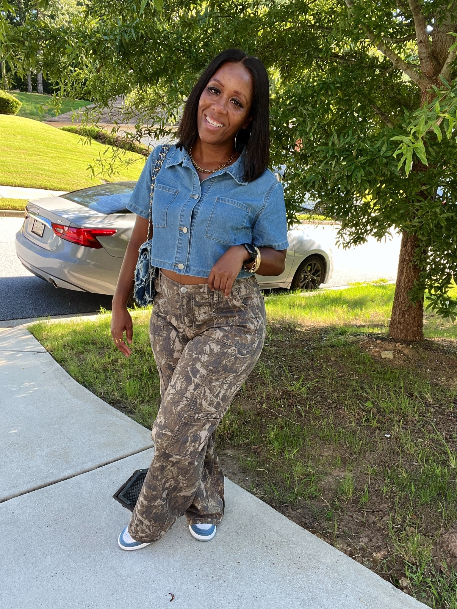 Styling my Jordan 1 Denim sneakers with a denim shirt and camo cargo pants for an easy casual sneaker outfit. I love how the denim-on-denim ties the look together while the camo pants add a little print without doing too much.

#LTKootd #LTKPetite #LTKOver40
