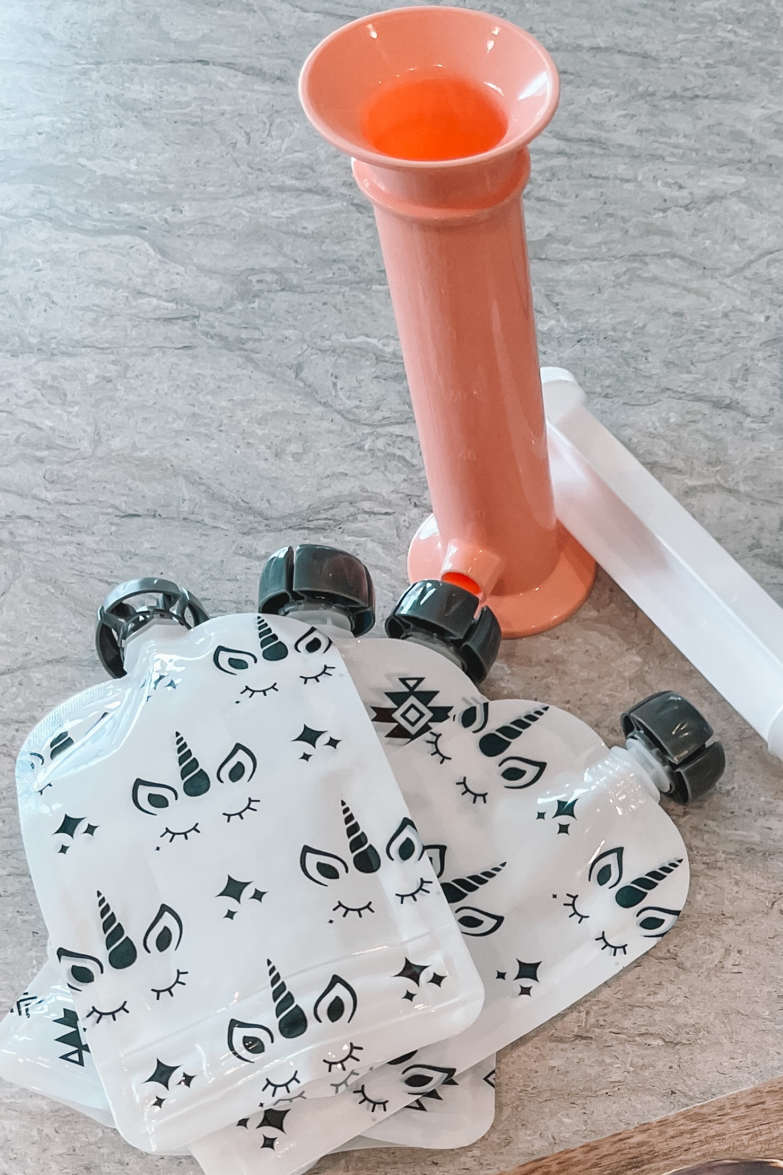 This baby food pouch maker is MAGICAL!!! No more messy pouch making. Easy to twist any store bought pouches on and easy to clean!!! This is also affordable as well🙌🏼

#LTKbaby #LTKkids #LTKFind
