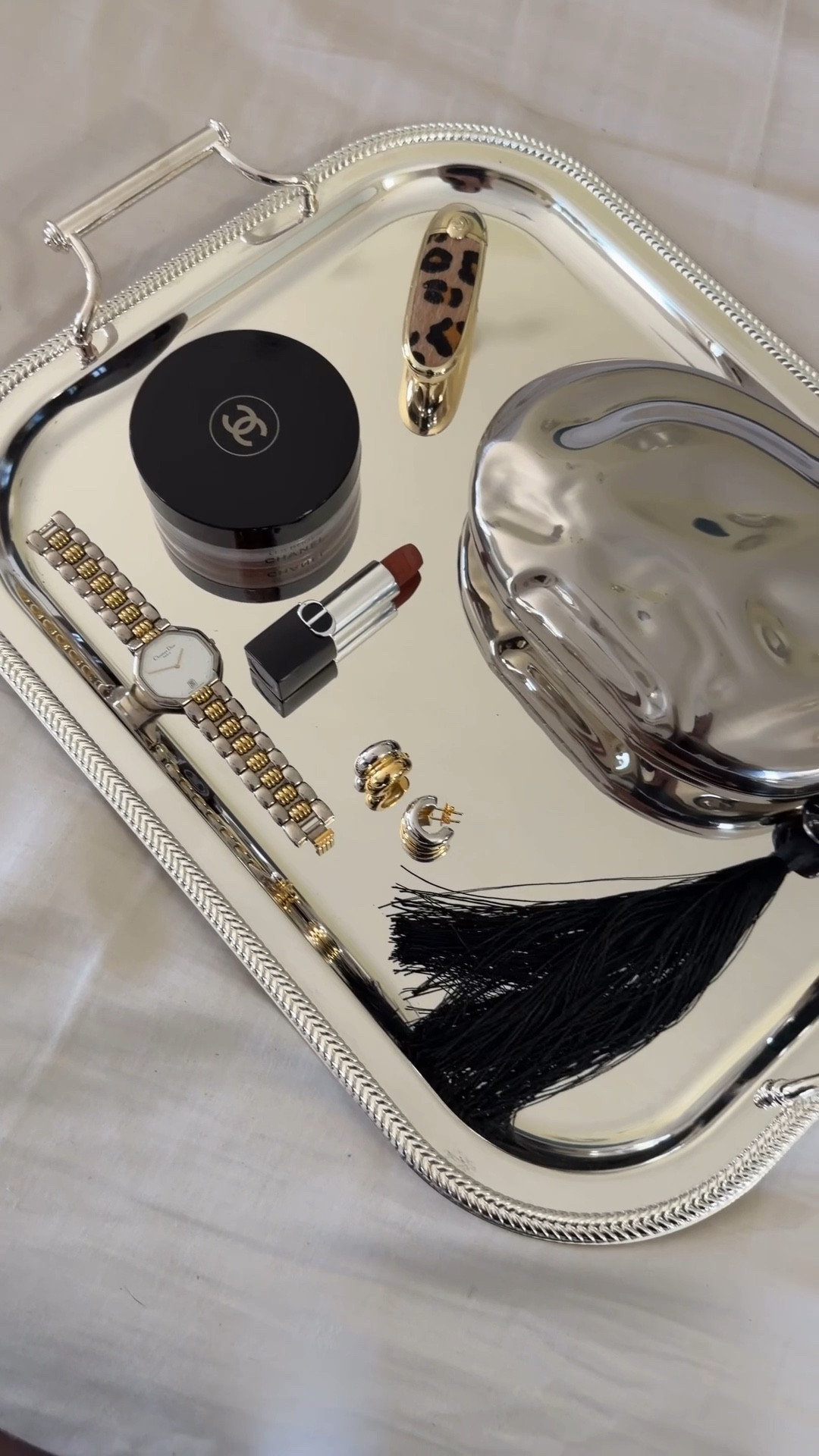 Use code: CWATTCM and save 10% off caitlyn minimalist jewelry. Silver serving tray, leopard, lipstick, luxury, silver, and gold hoop earrings.

#LTKHome #LTKSaleAlert #LTKBeauty