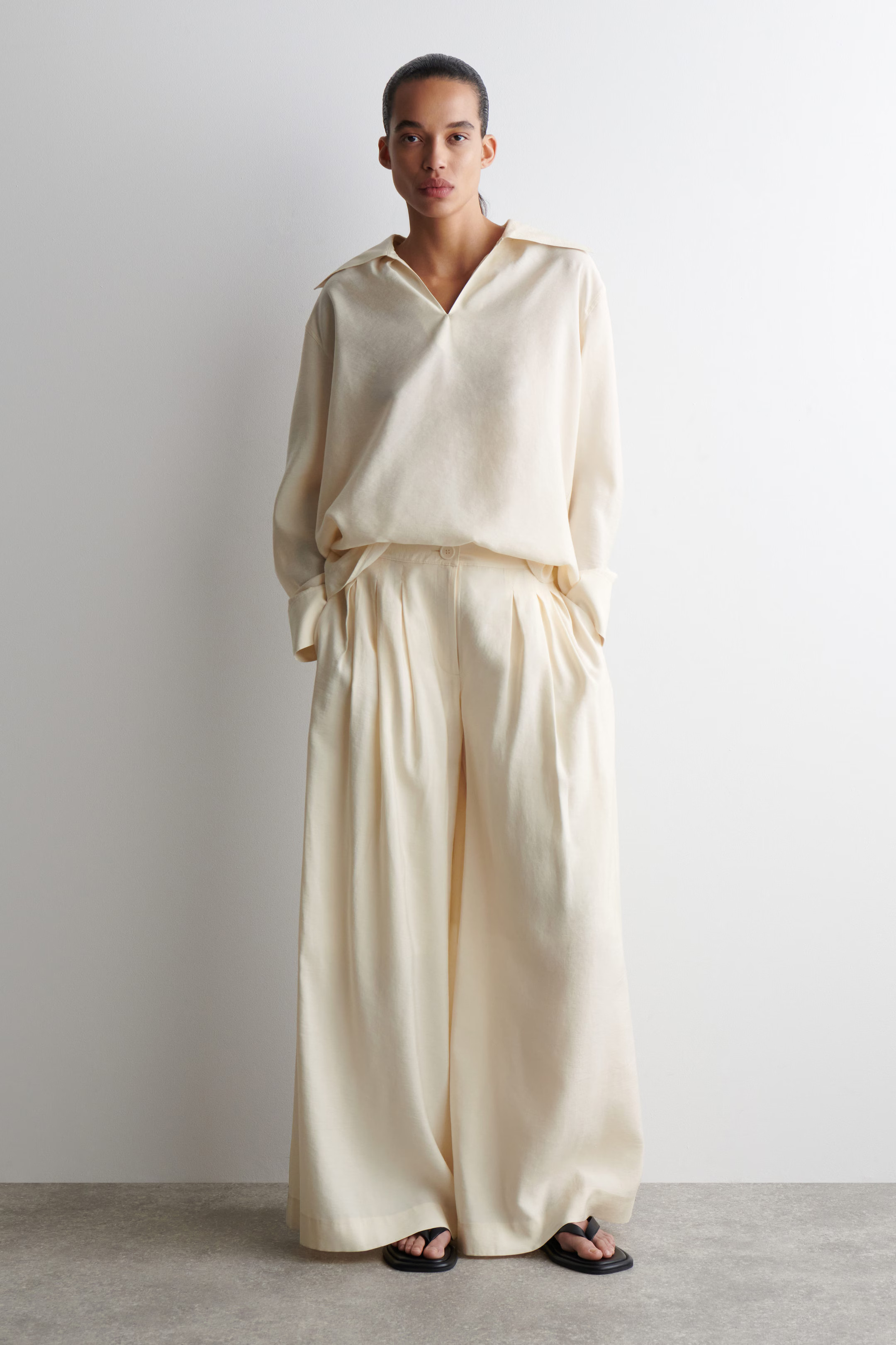 PLEATED MODAL WIDE-LEG TROUSERS - ECRU | COS US | COS (EU)