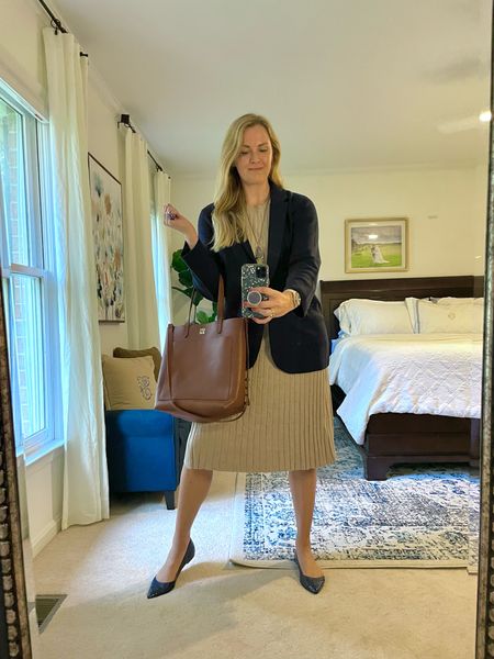 Fall outfit idea to wear to the office / Workwear 

Sweater dress is sleeveless and perfect for layering. Very flattering and fits true to size. Also comes in black.

Navy sweater blazer is the perfect polished and cozy piece for work days this fall. I sized down one. Currently 50% off!!

Leather tote


#LTKfindsunder50 #LTKSeasonal #LTKworkwear