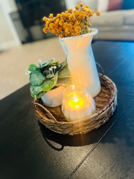 Coffee table centerpiece 
Candles | coffee table | pumpkins | flowers | fall | plants 

#LTKhome #LTKSeasonal