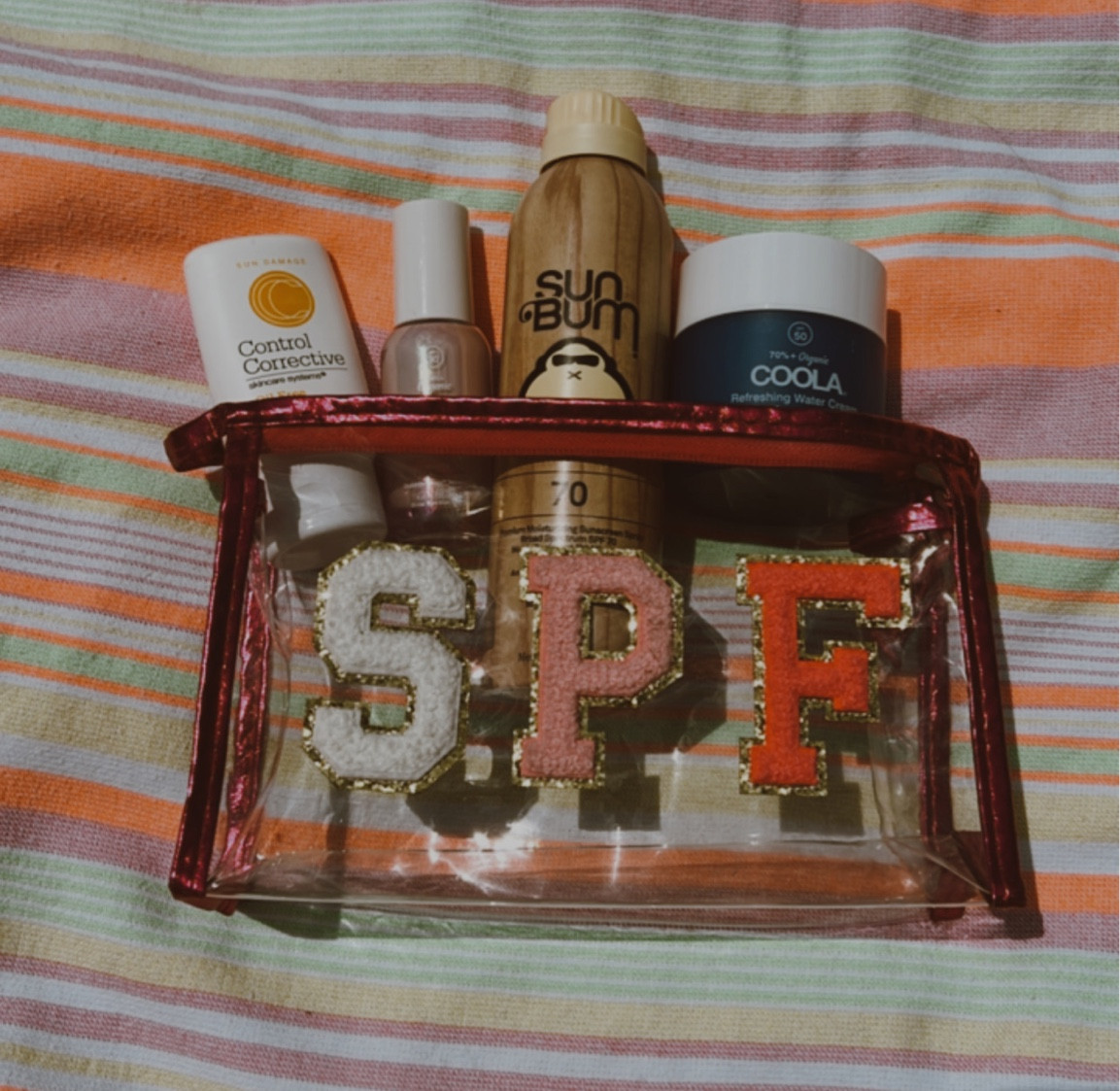 Cutest SPF bag and all the summer sunscreen essentials! from left to right info on products below! 

1. Lightweight everyday sunscreen that can be mixed with your moisturizer! 
2. The GLOW! Works great before makeup application or to wear alone for the glowiest glow! 
3. The scent alone is every reason for this to be your go to sunscreen! 
4. Apply this to your face for a smooth sunscreen after getting in the water at the pool or beach to keep your face protected! Also lightweight and makes your face very smooth and shiny! 
5. The SPF bag is 10/10. Super cute and spacious for all your sunscreen essentials and comes in 3 colors! 

#LTKbeauty #LTKswim #LTKSeasonal