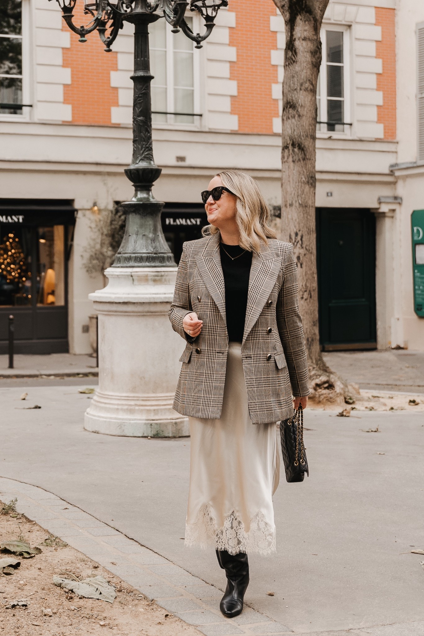 Paris outfit in fall. Slip skirt (size L), Veronica beard plaid blazer, boots, cashmere sweater 

#LTKSeasonal #LTKOver40 #LTKTravel
