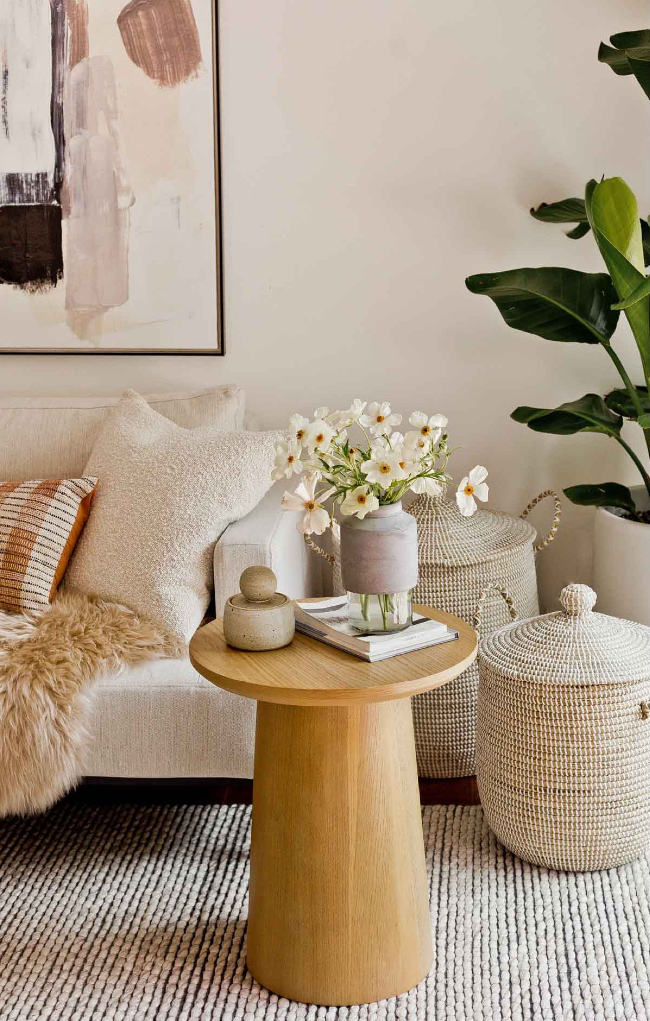 This Target side table feels like it could fit in any room (and any style) home. I used it for my mom’s living room makeover and was thinking about getting one at my house too. Great price for a side table imo. wood furniture - organic modern - home decor - neutral rug 

#LTKSale #LTKstyletip #LTKhome