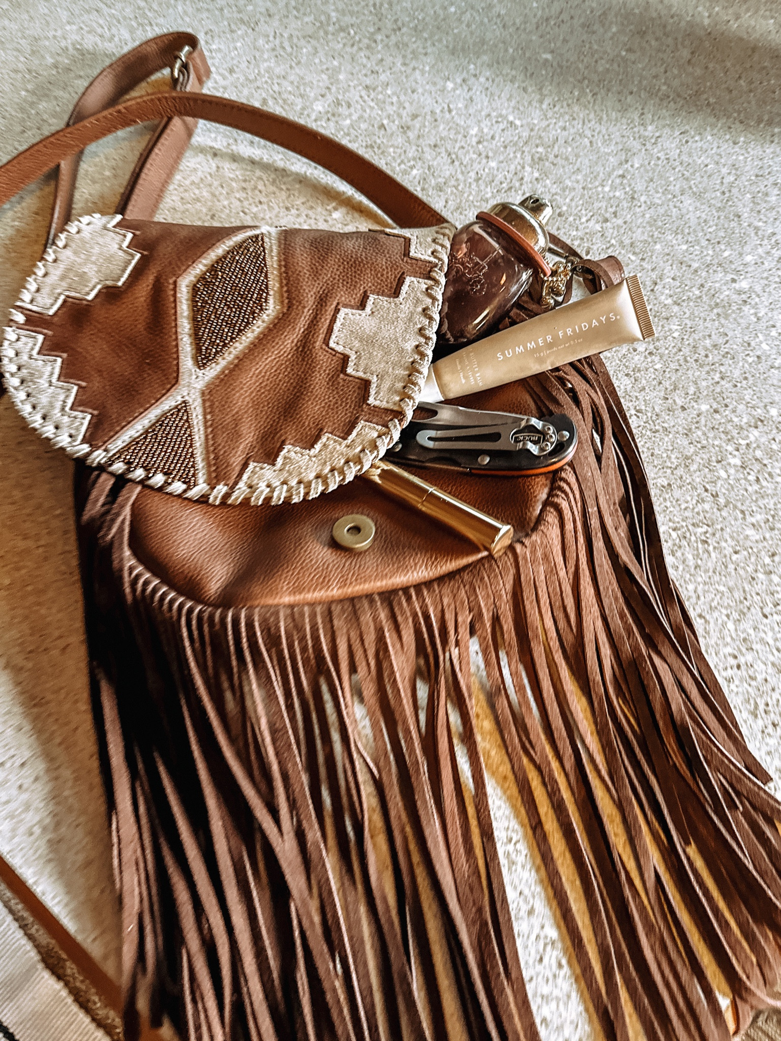 What in my purse as I am stomping through the streets of White Fish Montana 🇺🇸 2 of my favorite lip products for easy going summer vibes . & This fragrance is my FAVE for a light yet rich scent that lasts all day! 

#montanaVibes #summerlip 

#LTKbeauty #LTKtravel #LTKSeasonal