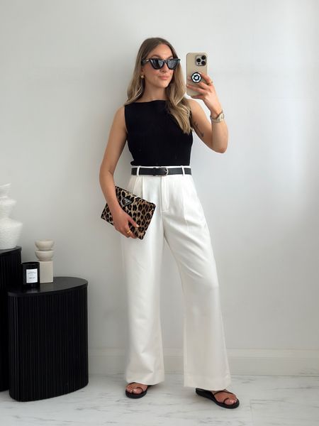 A simple outfit with white trousers & a black top. I’ve added interest with a leopard bag (mine is old Prada) 

Top: XS
Trousers: 26 short
Sandals are true to size 

#LTKstyletip #LTKshoecrush #LTKfindsunder100