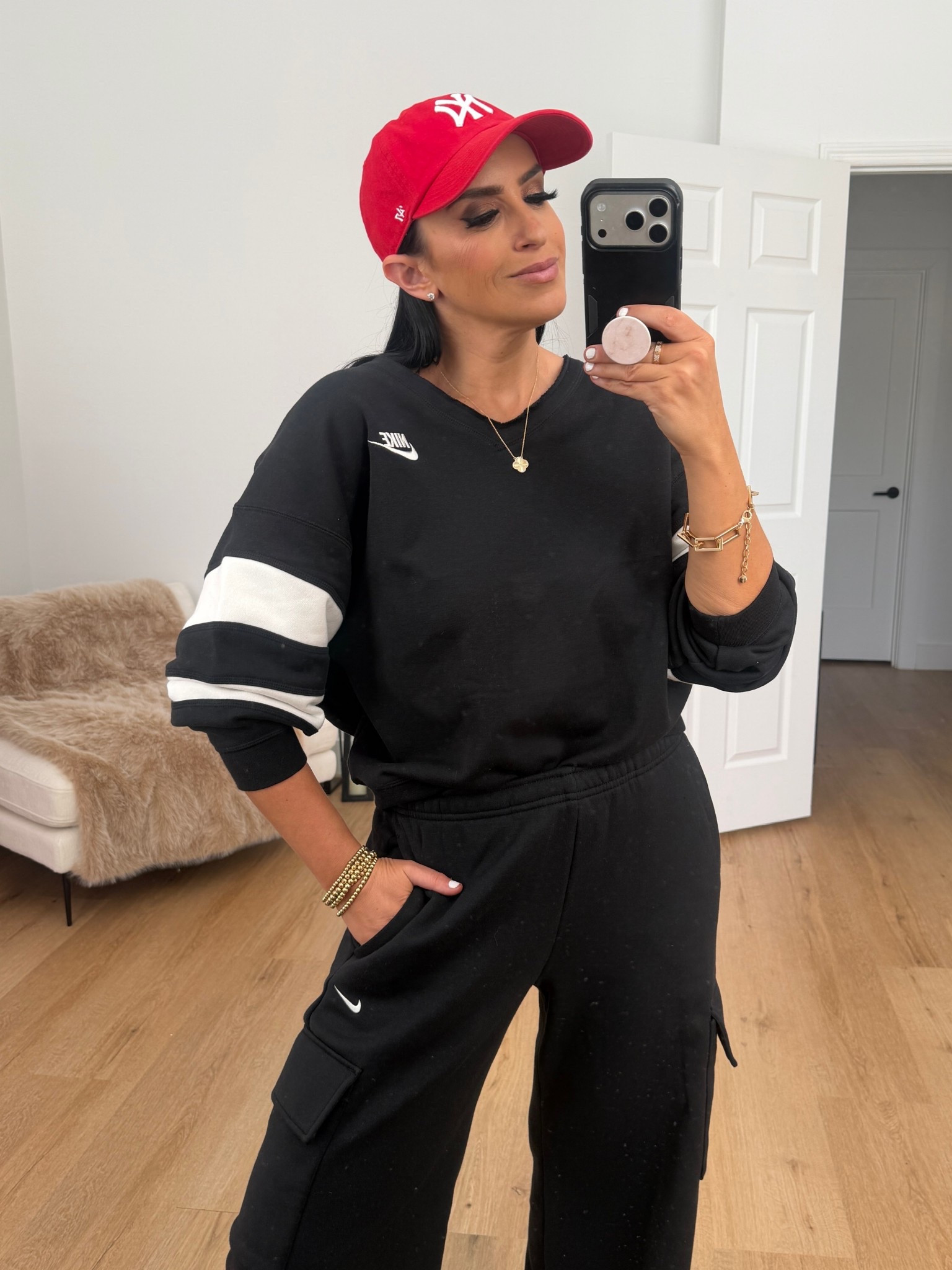 Woman’s Nike Sportswear Club Fleece. I’m wearing a size small.

Woman’s Nike Sportswear Phoenix Fleece cargo pants. I’m wearing a size small.