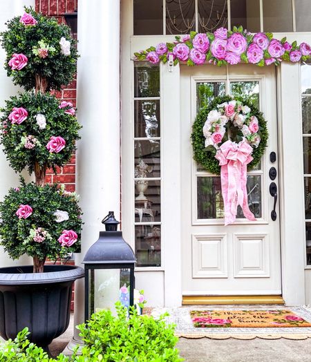Springtime pops of pink! I used these stunning topiaries from @theroundtopcollection and I placed two end-to-end and zip tied them to hooks to create a lovely floral garland atop my door. 

#LTKSeasonal