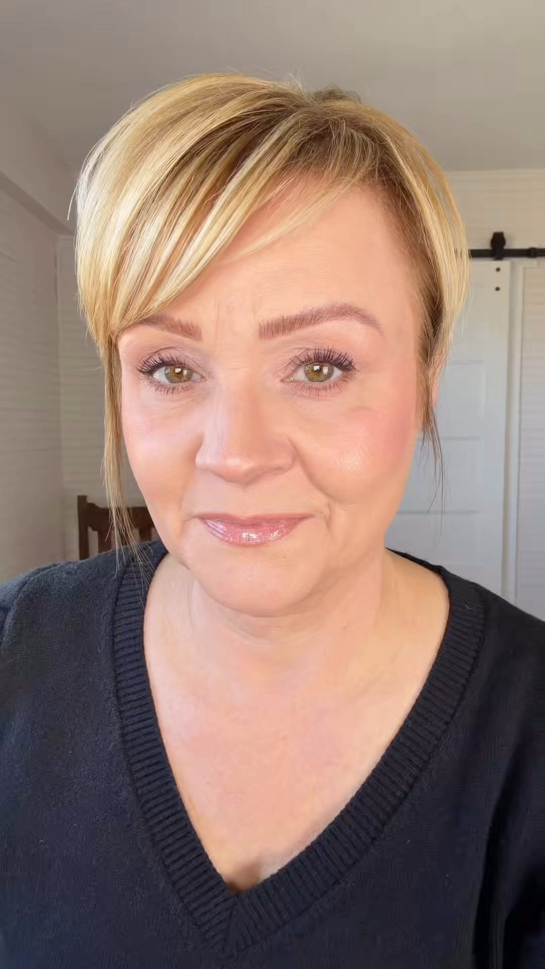 Easy, simple eye makeup for mature  hooded eyes.  No skill involved. 😉
Eye shadow single color is Petite.
Bronzer in Honey Bun
Smudging brush is linked.
Angled blush brush.
L’Oréal shadow stick in Celestial Taupe (medium brown with some sparkle). 
Black mascara. 
Love this setting spray.  Alcohol and butane free!  