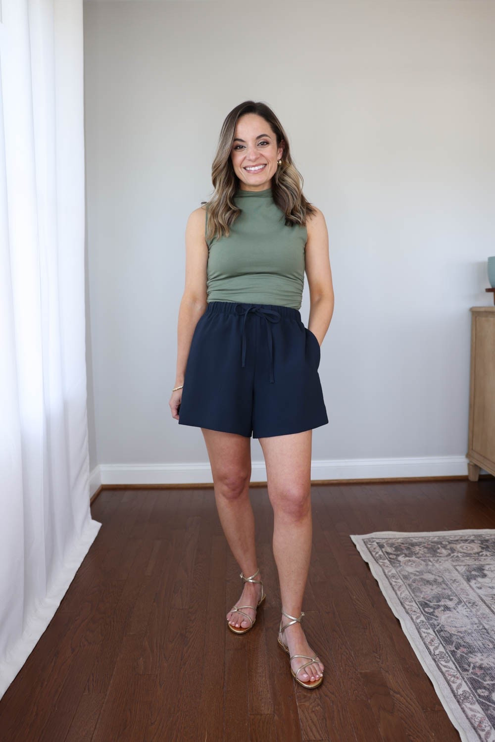 When it comes to tailored shorts, Aritzia does it best. Here is a look at three styles on my frame. (If I’m picking a favorite the agency shorts get my vote). 

Lodge Mid-Thigh in Crepe: xs - sized up 
11” rise | 5” inseam 

Top: xs 
Sandals: true to size

#LTKPetite