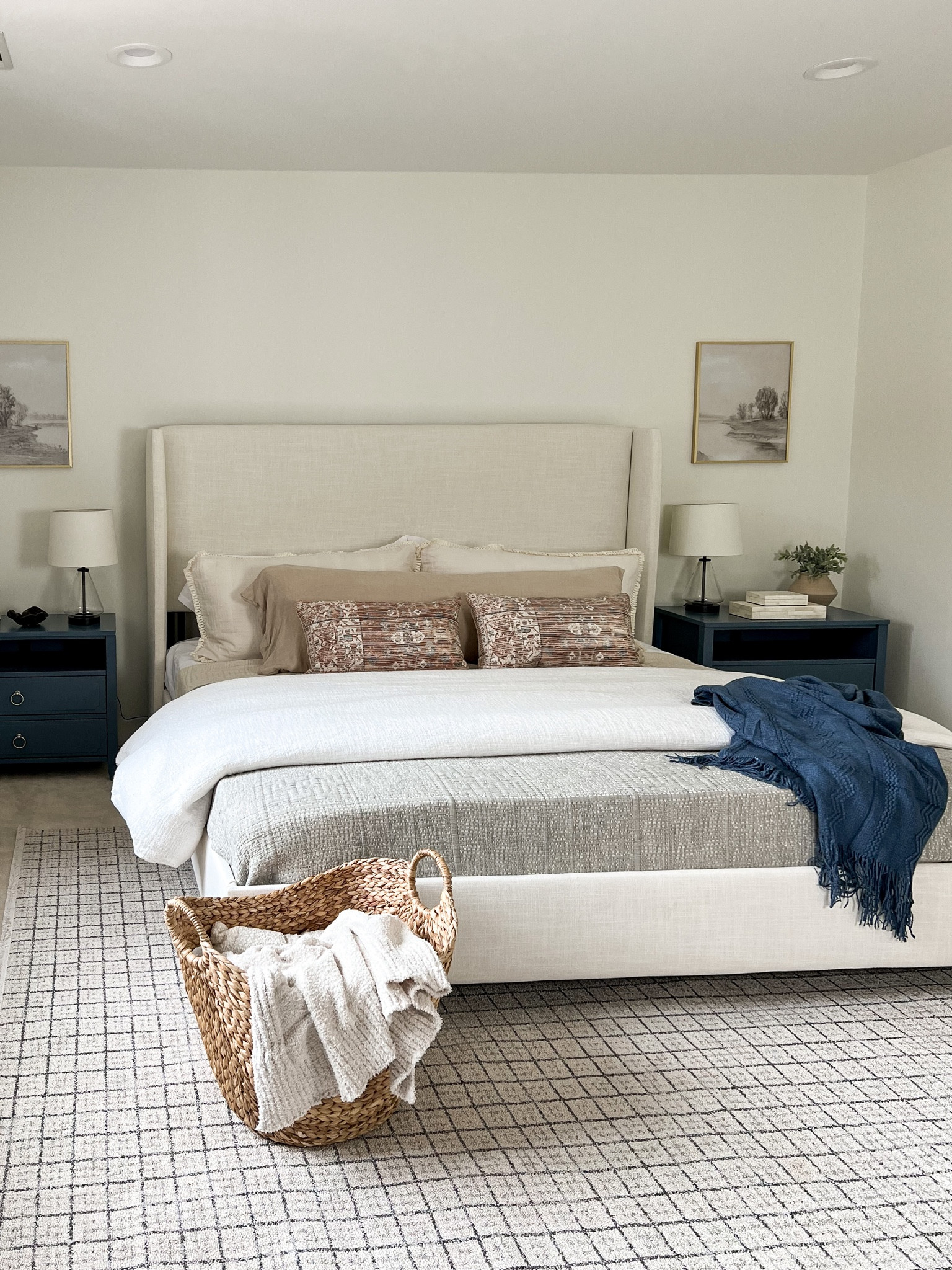 Love how this affordable bedroom came together! 
Walmart, upholstered bed, comforter, basket, blanket, bedroom, neutral bed, blue nightstand, artwork, gold frames, lamps, throw pillows

#LTKstyletip #LTKsalealert #LTKhome