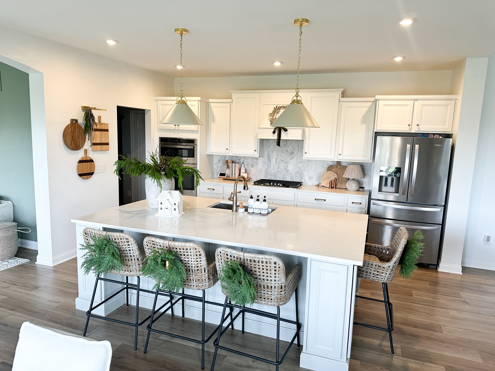 Christmas kitchen, Christmas decor, mini wreath, gold wreath, Christmas swag, velvet ribbon, Bailey woven stool, Ada enamel pendant, cutting board 

#LTKHoliday #LTKHome #LTKSeasonal