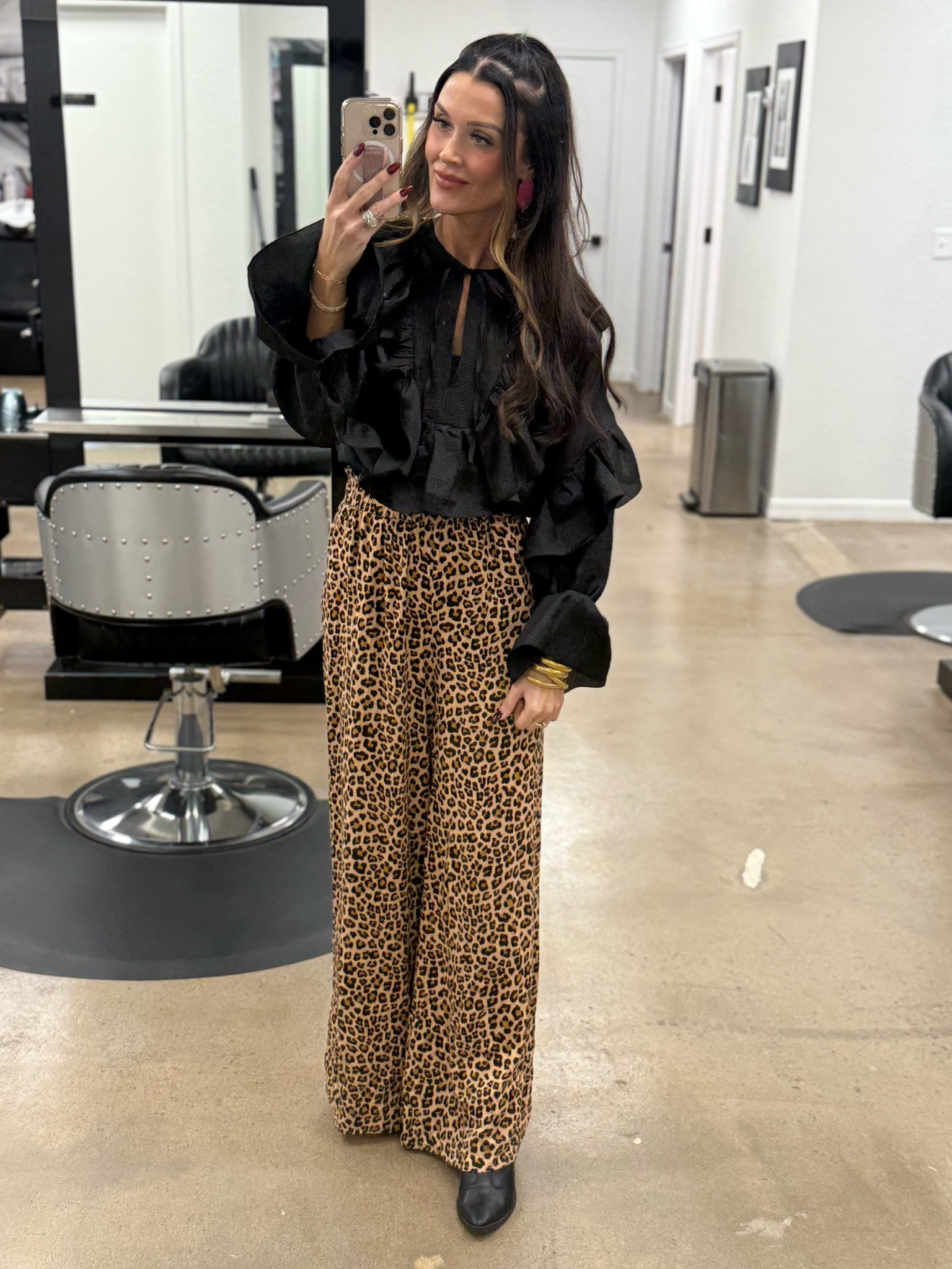 Black ruffle blouse
Leopard wide leg pants
Black western style booties 

#LTKStyleTip #LTKFindsUnder50 #LTKBeauty