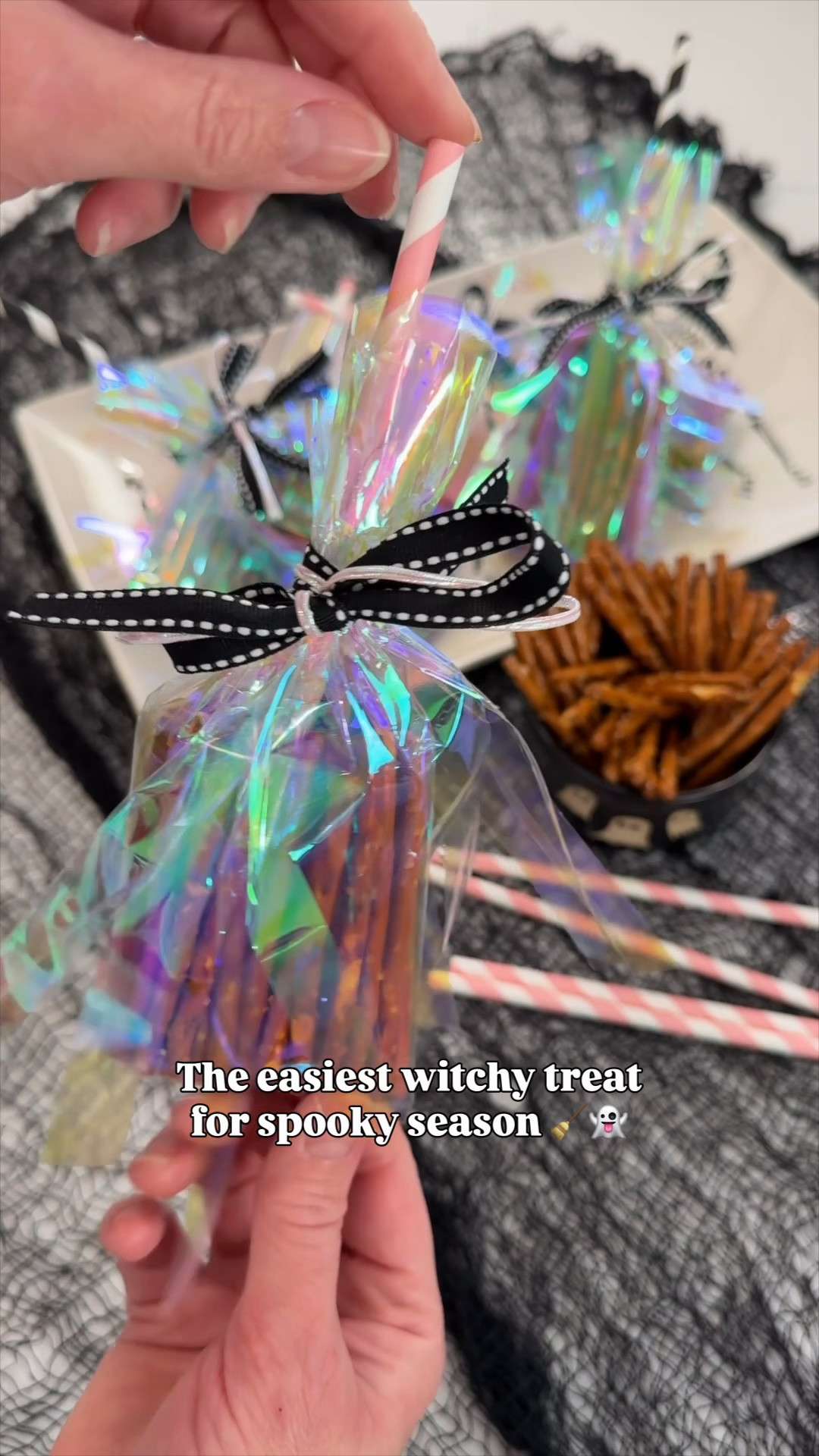 🧹✨ The Halloween treat idea you’ll want to save! These witch broom pretzel packs are such a fun way to turn a simple snack into a little spooky-season surprise. 👻💜

Fill an iridescent treat bag with pretzels, add a paper straw for the broom handle, use a second bag to create the broom fringe, then finish it off with a ribbon. 🎀🎃

Perfect for classroom treats, Halloween parties, boo baskets or passing out to trick-or-treaters!

#HalloweenTreats #HalloweenDIY #WitchBroomTreats #ClassroomTreats #HalloweenPartyIdeas #BooBasketIdeas #SpookySeason #LTKFamily

#LTKSeasonal #LTKHome #LTKKids