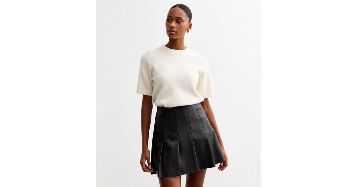 Black Leather-Look Pleated Mini Skirt 
						
						Add to Saved Items
						Remove from Saved It... | New Look (UK)