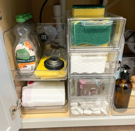 Home organization! These clear containers made the under sink storage so organized! First this set of 2 stackable clear containers are great for holding my garbage bags and extra dish soap. Next I used these 4 clear shoe drawers to hold my sponges, magic erasers, pot scrubbers, and dishwasher pods. I already had the drawers so I linked a similar product I found on Amazon. 

#LTKhome #LTKunder50 #LTKFind
