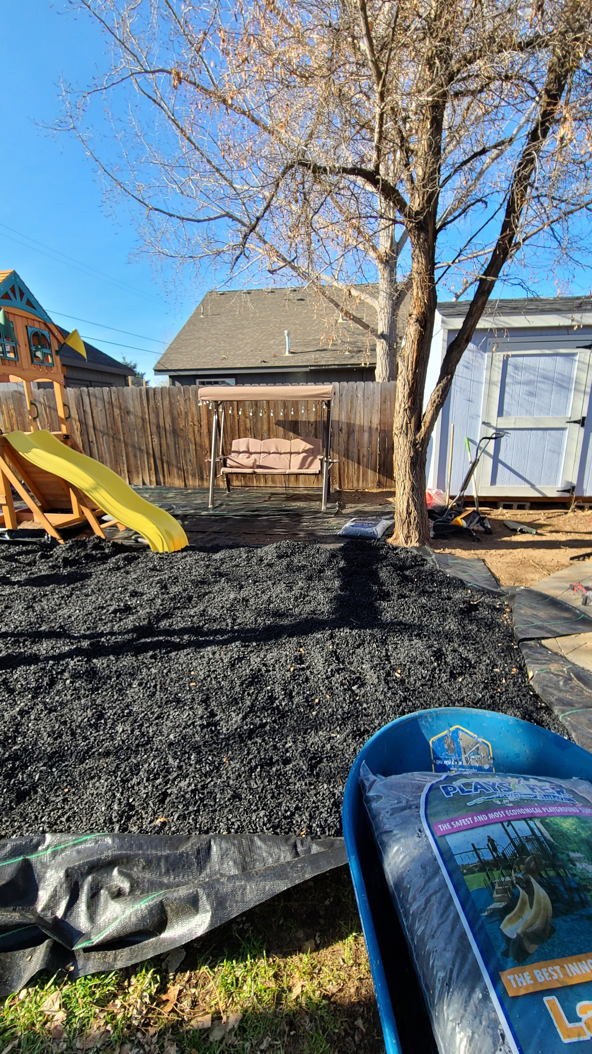Rubber mulch under a playset is one of those decisions you do not regret. Soft landing, no splinters, and it actually stays put. Way better than wood chips and so much easier to maintain long term. 

 #LTKHome #LTKKids