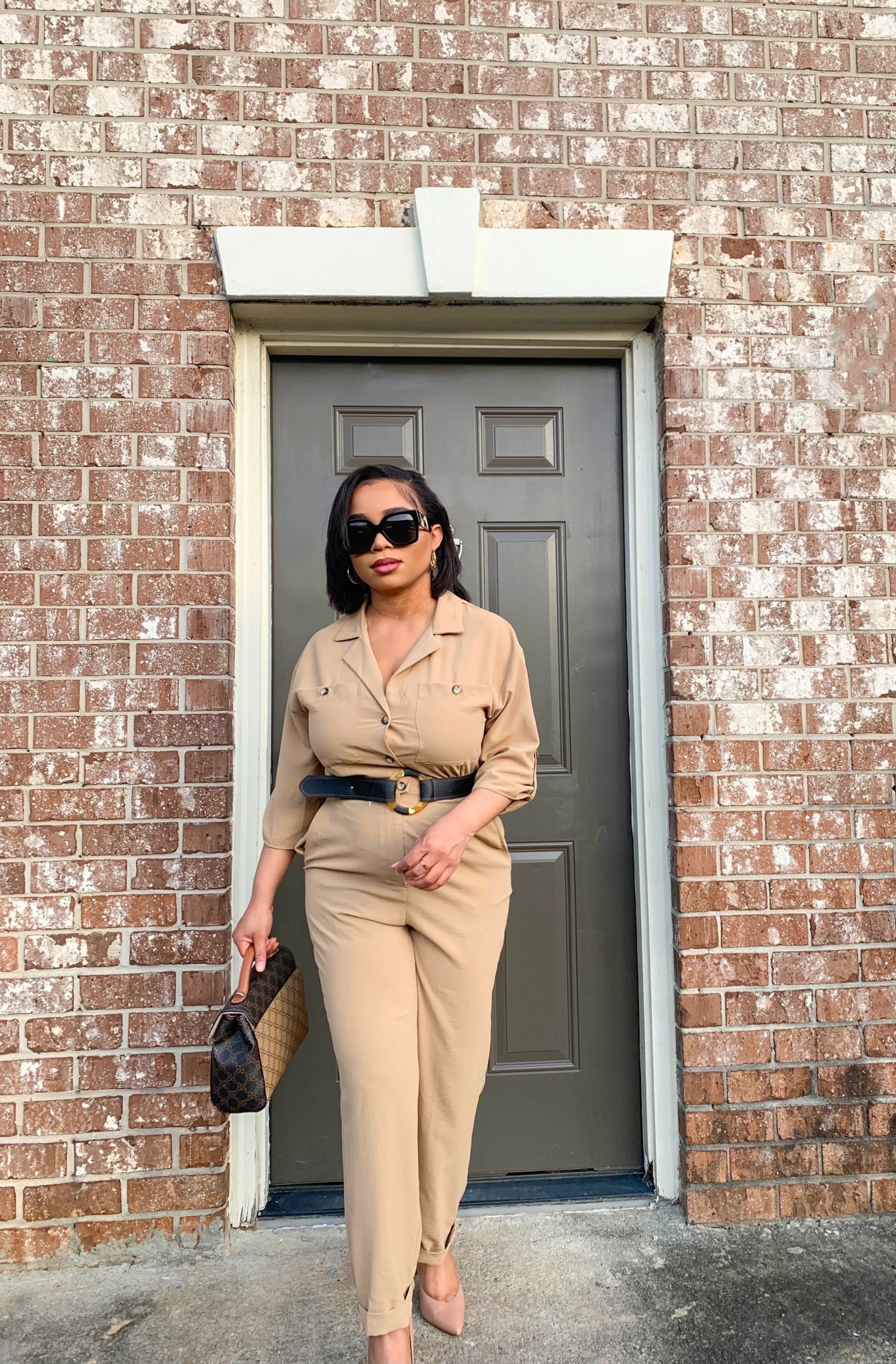 This brown khaki belted jumpsuit has quickly become one of those pieces I keep reaching for 🤎 As a petite woman, finding a jumpsuit that actually fits and flatters is a win and this one cinches perfectly at the waist, elongates the legs, and gives that effortless, pulled-together look without trying too hard.

What I love most is how versatile it is. Style it with heels and gold accessories for work or dinner, throw on a blazer for meetings, or keep it casual with flats or sneakers for errands and travel days. One piece, endless outfits, exactly the kind of staple that makes getting dressed easy.
If you’re building a capsule wardrobe or want a go-to outfit that works for multiple occasions, this jumpsuit is it. Chic, comfortable, and made for petite frames.

Scroll down to shop a similar jumpsuit and style it your way ✨
 petite jumpsuit, brown khaki jumpsuit, belted jumpsuit women, petite outfit ideas, jumpsuit for short women, versatile jumpsuit, capsule wardrobe women, work jumpsuit women, casual jumpsuit outfit, chic jumpsuit women, LTK petite fashion, petite style essentials

 #PetiteStyle #PetiteFashion #JumpsuitStyle #CapsuleWardrobe #WorkOutfitIdeas #EverydayChic #NeutralOutfits
 

#LTKPetite #LTKgrwm #LTKPetite #LTKootd
