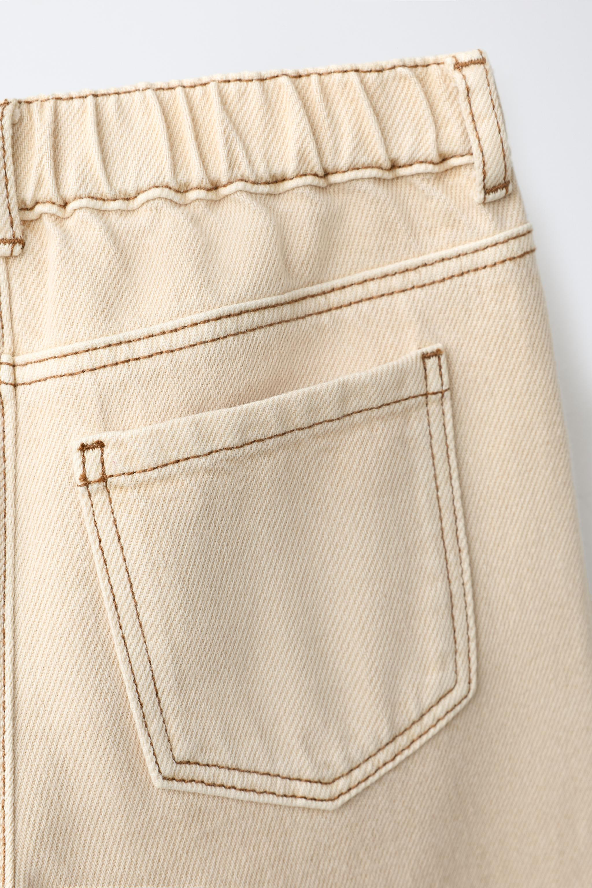 Twill culotte pants featuring an elastic waistband and front snap-button closure. Front pockets a... | Zara US