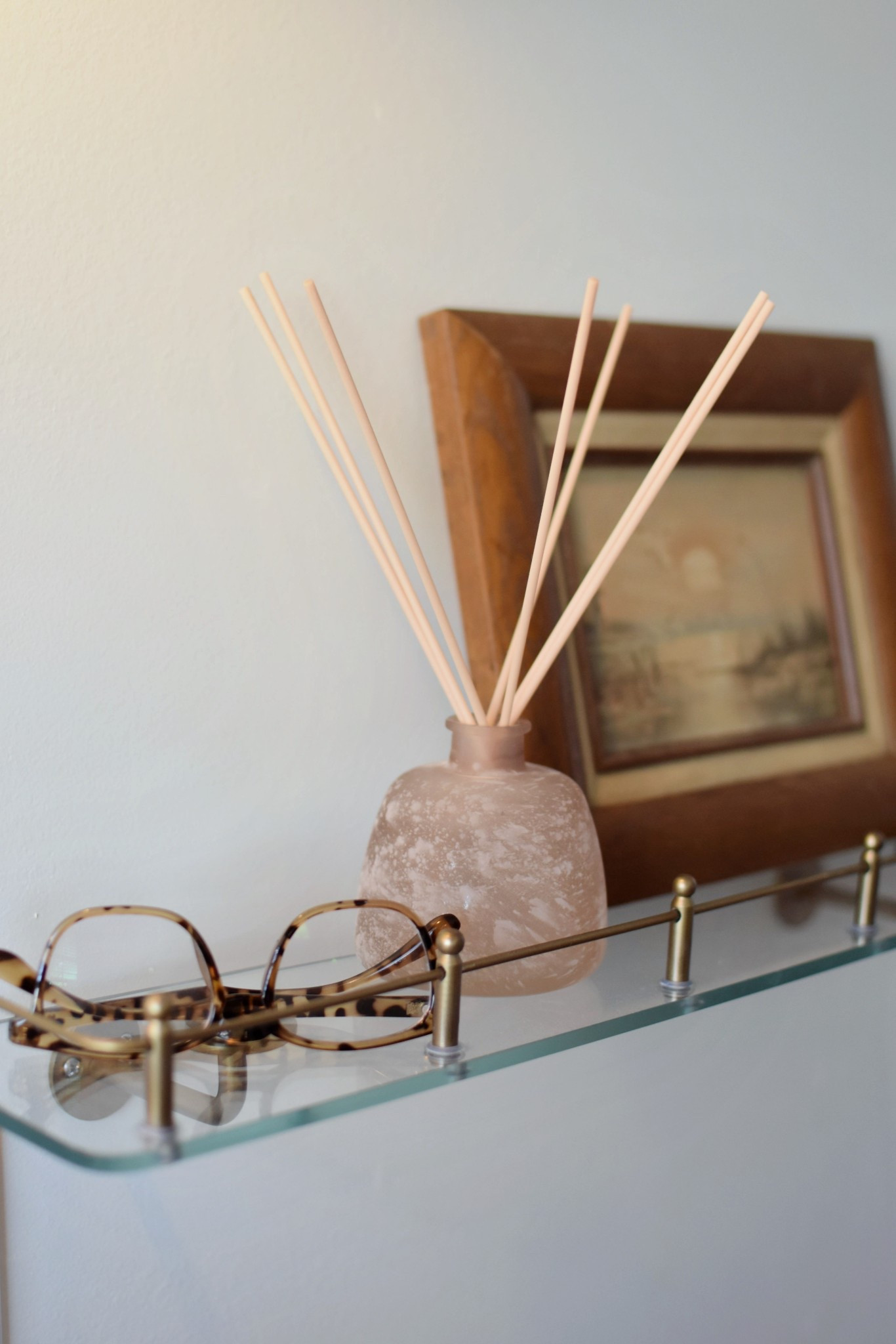 The reviews were mixed on this floating shelf, but for us it’s great for the space. There is a space between the glass shelf and the wall, so be aware!

#LTKHome