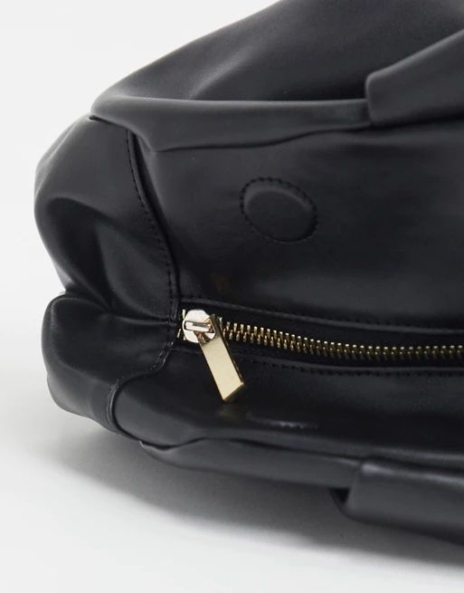 ASOS DESIGN oversized ruched clutch bag in black | ASOS (Global)
