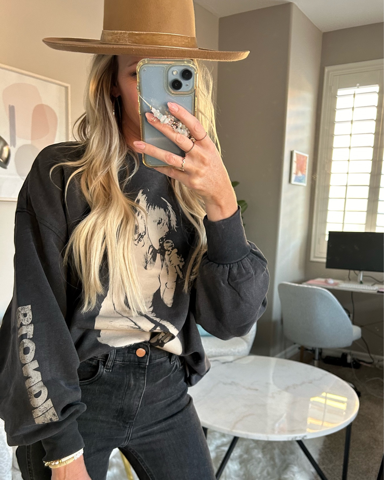 This Blondie sweatshirt is on sale!! I styled it here with a hat and jeans! Its lightweight and perfect for transition into spring! 

#LTKfindsunder50 #LTKSpringSale #LTKsalealert