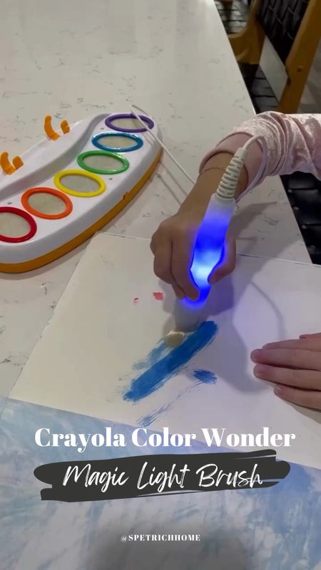 Watch as my little one uses the Crayola Color Wonder Magic Light Brush Art Set. Not only does the brush light up to reveal paint colors (how cool is that?!) but this set is a mama's dream—totally mess-free. Yep, the paint only appears on the special Color Wonder Paper, meaning no unexpected art on walls, clothes, or tiny hands. 🙌 

#art #craft #toddler #paint #nomess 

#LTKtravel #LTKfamily #LTKkids