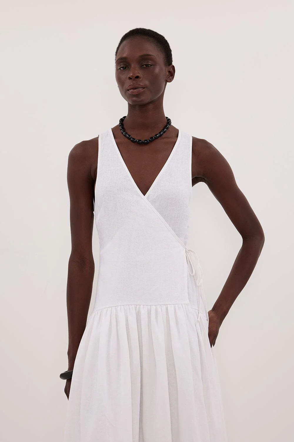 ILIO WHITE SLEEVELESS LINEN WRAP MIDI DRESS | DISSH